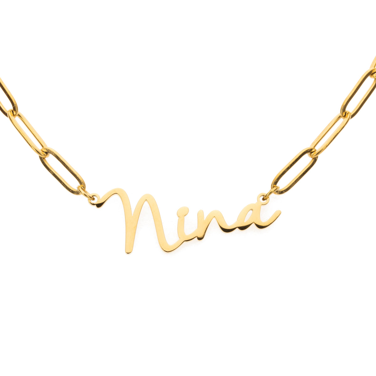 A gold-colored necklace with a script pendant that reads 'NINA'.