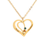 A gold-plated necklace with an intertwined hearts pendant, featuring two engraved names and a small birthstone on one of the hearts.