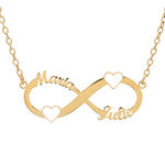 A gold-colored necklace with a double heart infinity symbol, with the names 'Maria' and 'Julie' engraved on it.