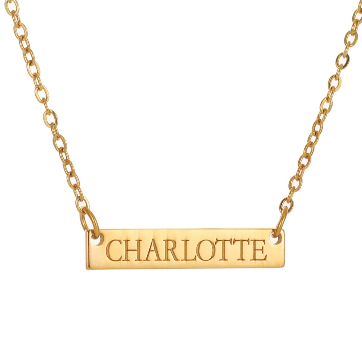 Gold necklace with 'CHARLOTTE' pendant on a white background